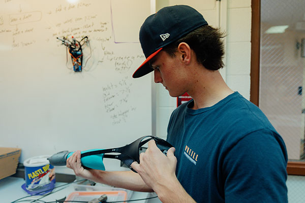 bionic arm with student