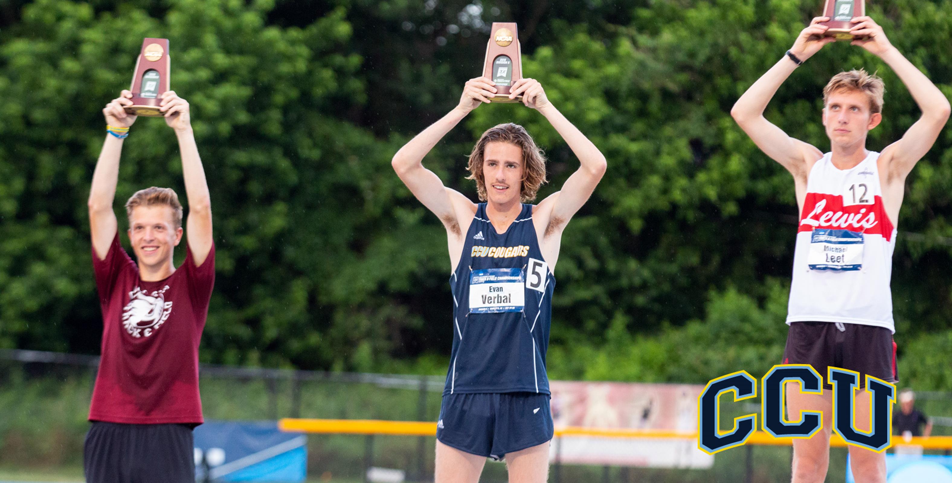 Coach Evan Verbal holding up a trophy when he was a CCU student athlete