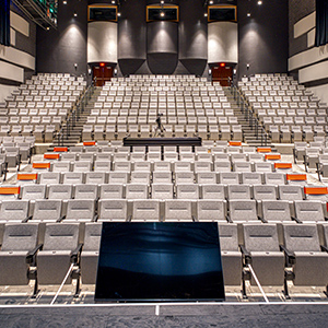 A photo taken from the stage looking to the back of the McDonald Performance Hall