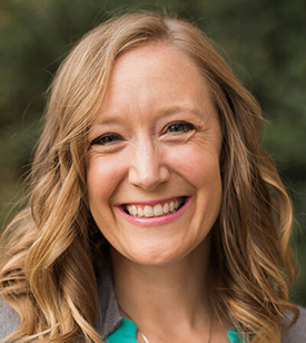 Dr. Lacy Cleveland smiling in her headshot